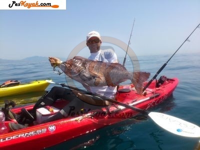 Peska en kayak de Mero